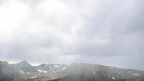 fog_over_mountains_where_snow_thaws.jpg