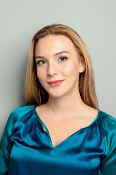 A headshot of Quinn Lewis