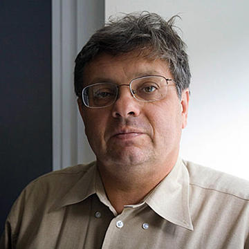 A headshot of Professor Eugene Shakhnovich