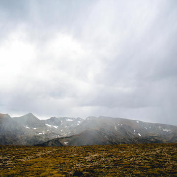 Thawing ground in Alaska sends vapors into the air over mountains