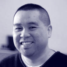 A headshot of Roel Torres