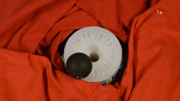 A soft ring oscillator nudges a ball around a ring