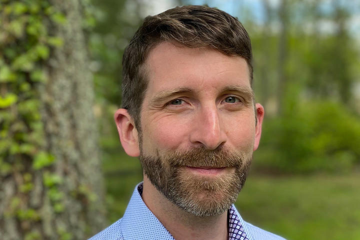 A headshot of Benton Taylor