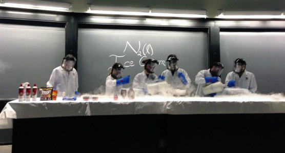 Tucci shows summer school students how to make ice cream with liquid nitrogen