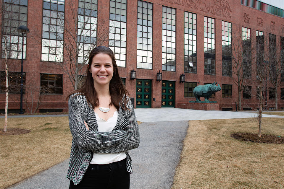 A photo of Meghan Blumstein standing outside the Biological Laboratory building on campus