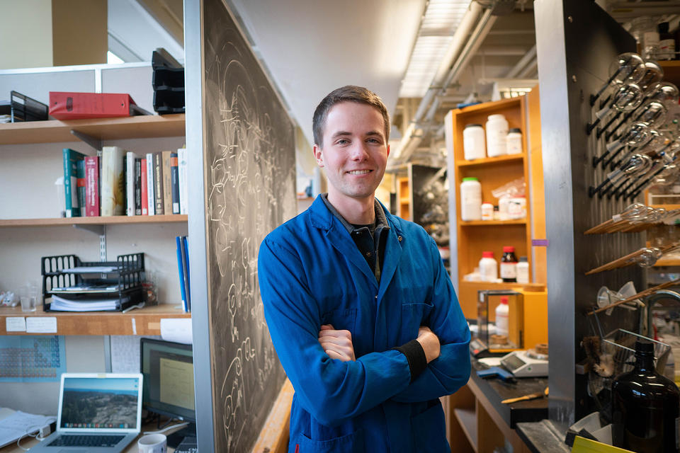 A photo of Porter Ladley standing in his lab