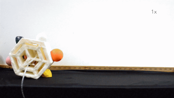 Balloons inflate and deflate to roll a foam hexagon robot across the floor