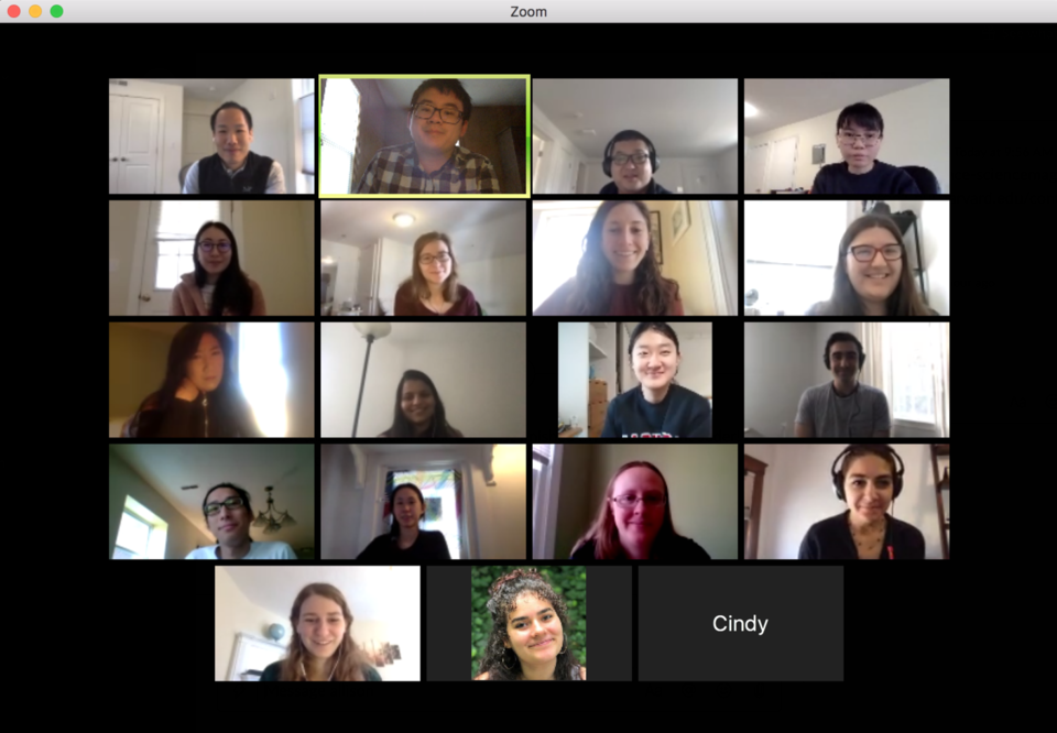 A screenshot of a virtual Liau lab meeting with a grid of all the lab members' faces