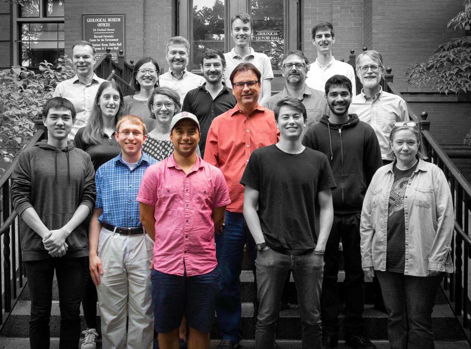 A black and white photo of Keutsch lab members with only Frank Keutsch, Josh Shutter and Josh Cox in color